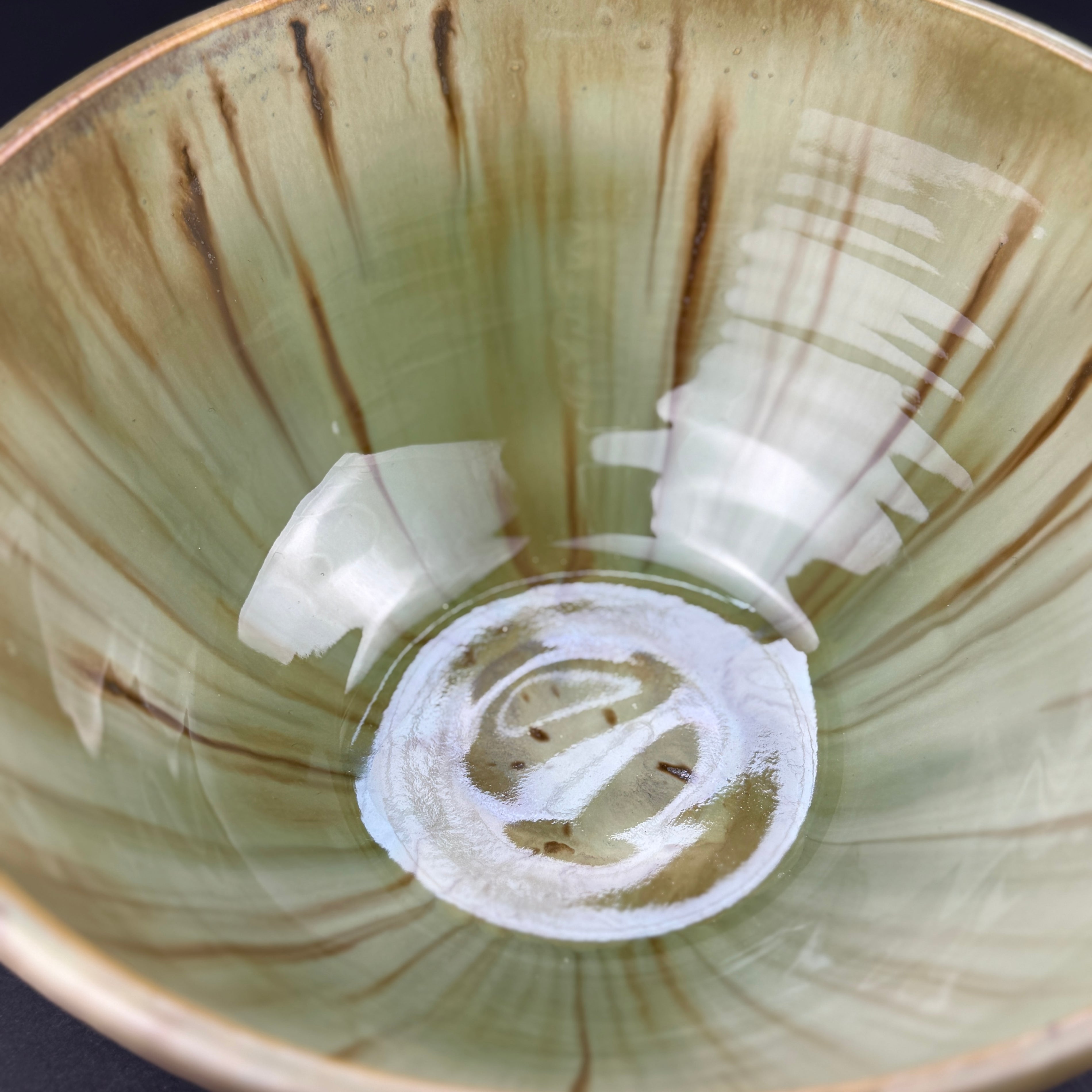 Deep medium bowl with gorgeous green flowing glaze