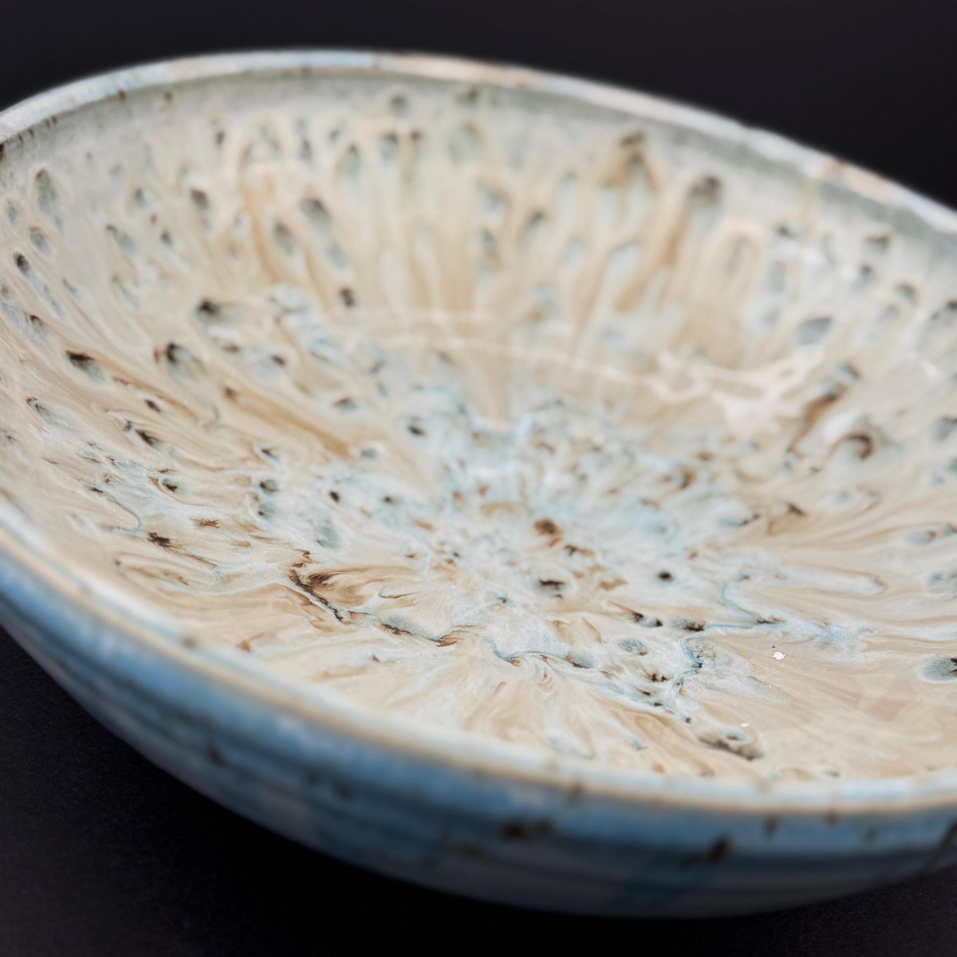 Large bowl with flowing turquoise glaze