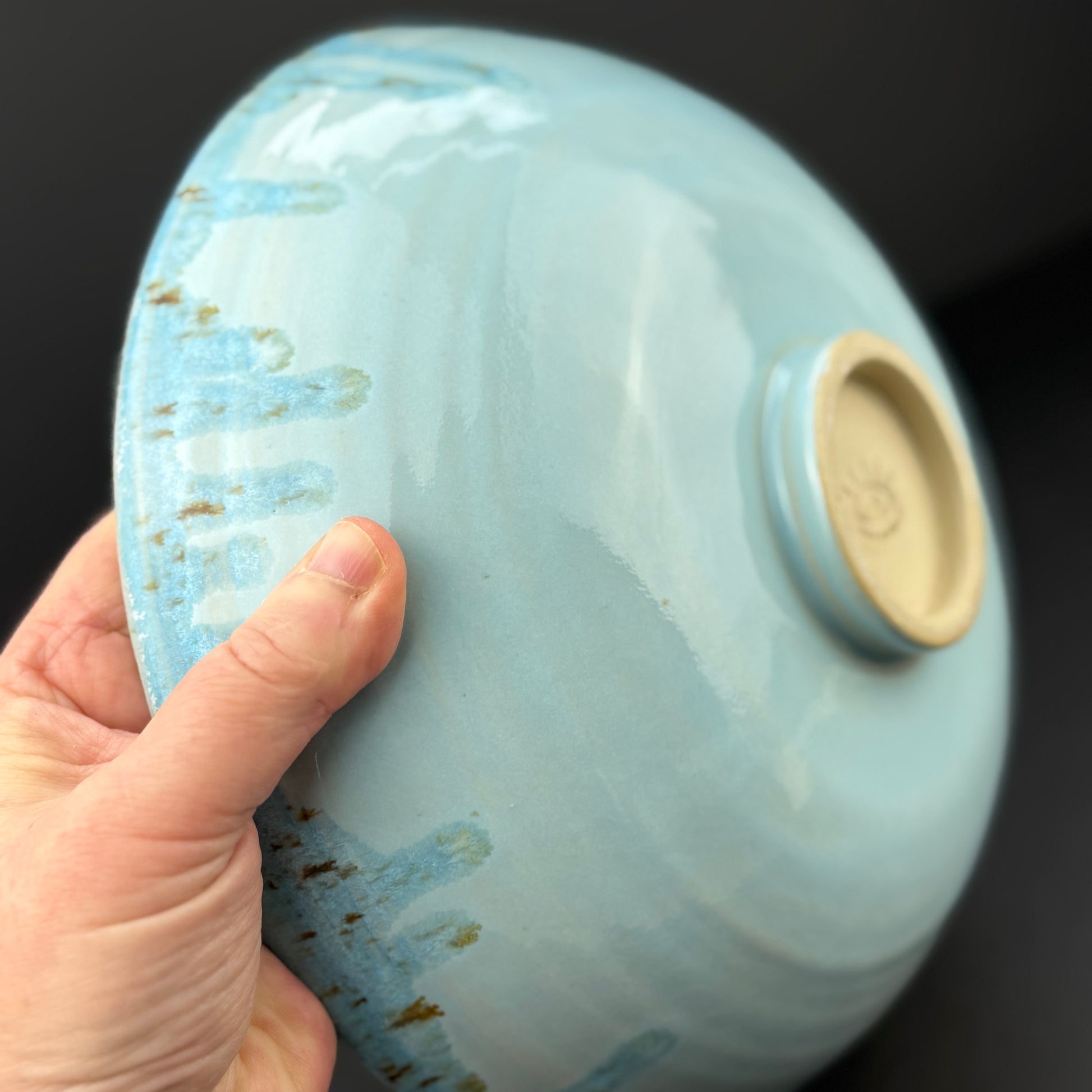 Large bowl with flowing turquoise glaze